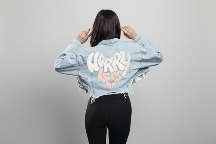 Oversized cropped denim jacket with Worry Less graphic