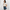 Woman wearing a white USA teddy bear crop top and denim mini skirt – perfect patriotic summer outfit