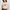 Woman wearing a white USA teddy bear crop top and denim mini skirt – perfect patriotic summer outfit